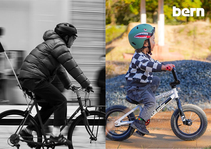 ヘルメットを被って自転車で走る大人の男性と2歳くらいの男の子のイメージ