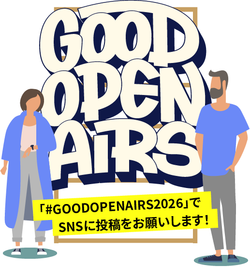 LOGO OBJETの前でポーズをとる男女